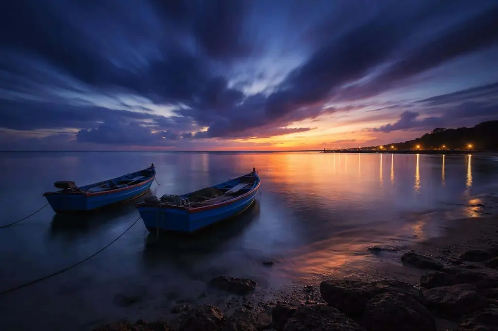 Blue Fishing Boats at Indigo Coastal Twilight