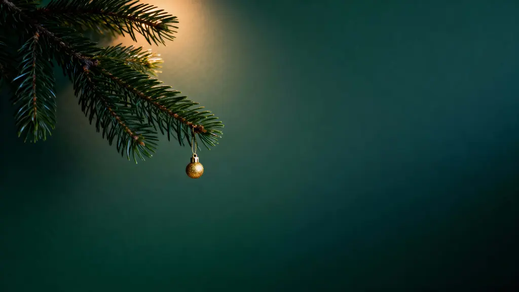 Pine branch with golden ornament