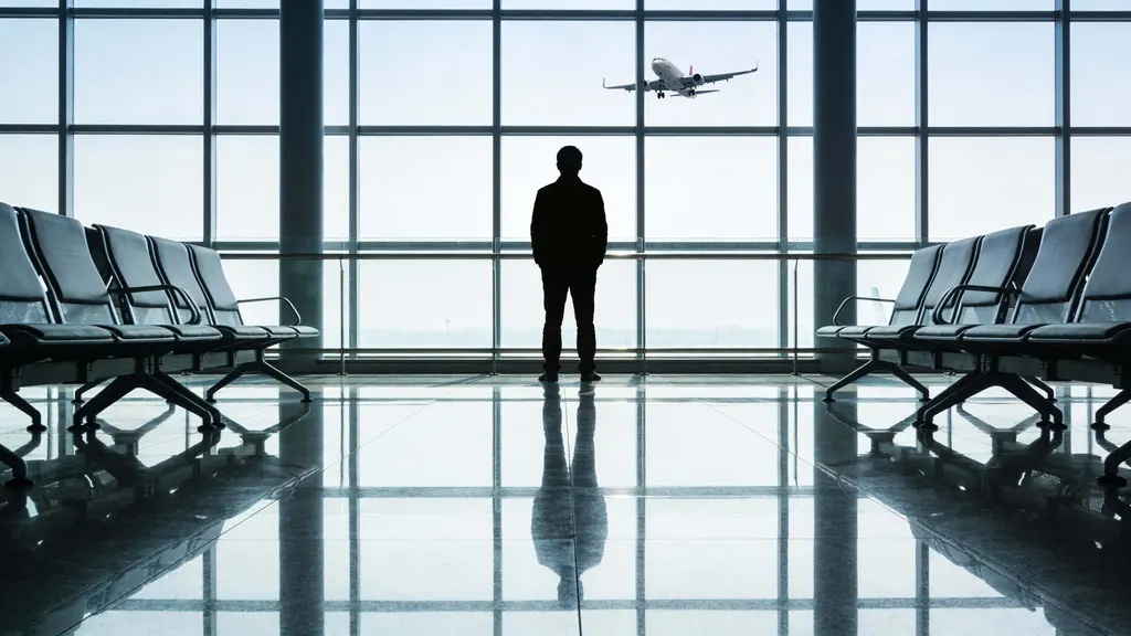 Traveler in modern airport terminal