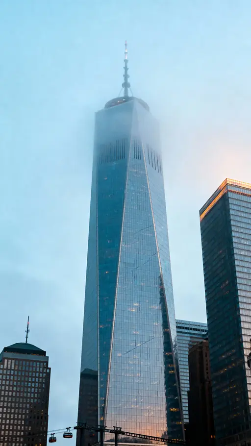 Chrome Skyscrapers in Vertical Mist