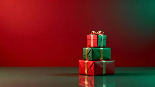 Stacked gift boxes on crimson backdrop