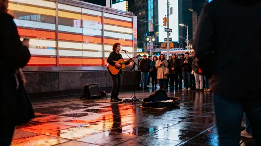 Street Performer Playing Guitar at Night