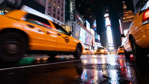Yellow Taxis in Times Square Night